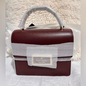 Kate Spade Reegan Top Handle Crossbody (DARK MERLOT)